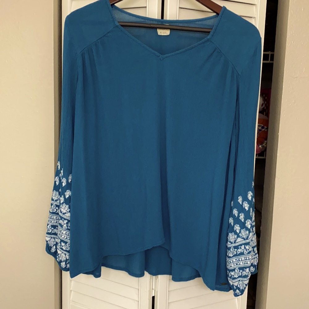 3/20 Teal O’Neill top.